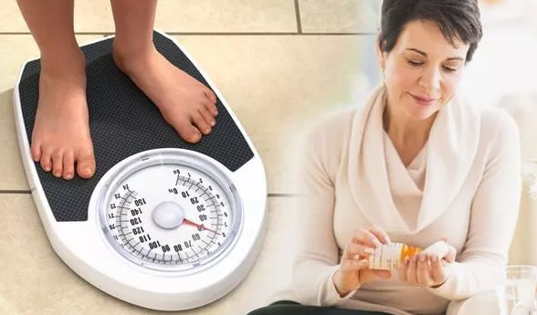 lady and weighing scale